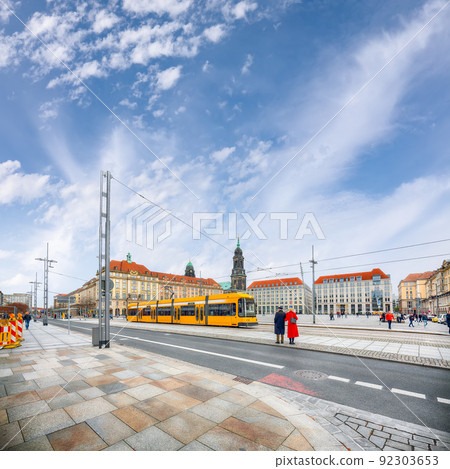 Attractive cityscape of Herbstmarkt and Holy Cross Church bell and clock tower in Dresden Attractive cityscape of Herbstmarkt and Holy Cross Church bell and clock tower in Dresden 92303653