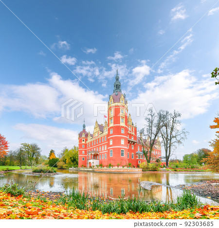 Breathtaking autumn landscape with Muskau castle. Breathtaking autumn landscape with Muskau castle. 92303685