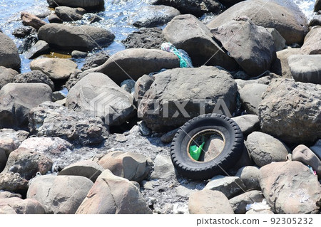 [Echizen Town, Fukui Prefecture, July] Vehicle tires thrown into the Sea of Japan along the Echizen coast 92305232