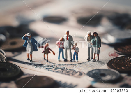 Miniature family and money Miniature family and money 92305280