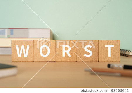 Worst / worst image | Desk with a block labeled "WORST" 92308641