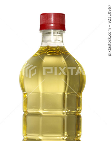 A bottle of Palm kernel Cooking Oil, isolated on white background A bottle of Palm kernel Cooking Oil, isolated on white background 92310967