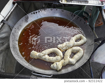 "Patongo" popular street food in Thailand 92311422