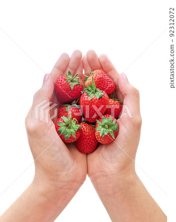 healthy eating, dieting, vegetarian food and people concept - close up of woman hands holding strawberries at home 92312072