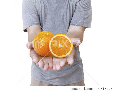 fresh orange on the hand male on white Background fresh orange on the hand male on white Background 92313797