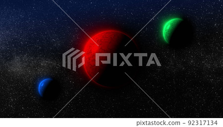 Image of red, green and blue planets in black space 92317134