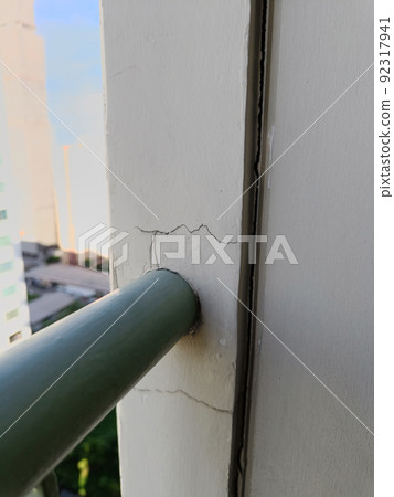 Balcony cracked concrete building or cement wall broken at the outside effect with earthquake Balcony cracked concrete building or cement wall broken at the outside effect with earthquake 92317941