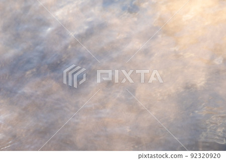 Background material: Steam texture of hot springs floating on the surface of the water in the morning light 92320920