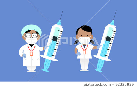 Woman doctors holding syringes 92323959