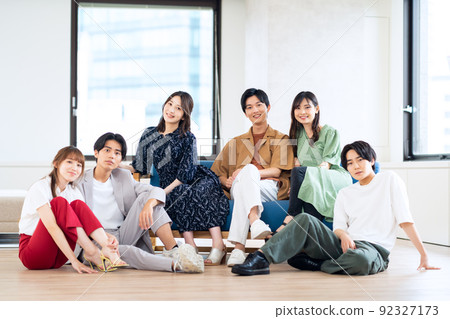 Men and women Gen Z friends college students share house living 92327173