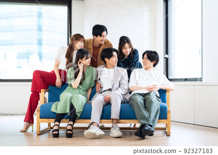 Men and women Gen Z friends college students share house living 92327183