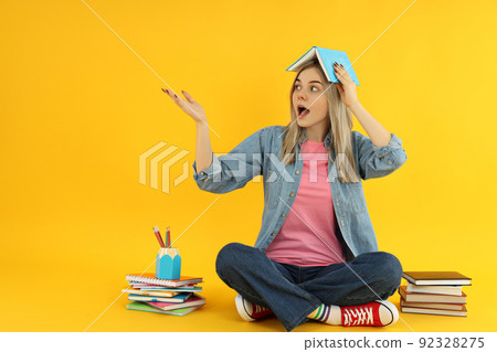 Concept of preapring to exams and tests with student girl Concept of preapring to exams and tests with student girl 92328275
