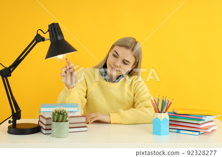 Concept of preapring to exams and tests with student girl Concept of preapring to exams and tests with student girl 92328277