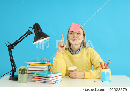 Concept of preapring to exams and tests with student girl Concept of preapring to exams and tests with student girl 92328279