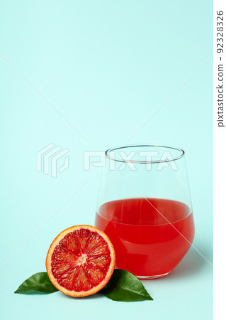 Concept of fresh drink with red orange juice Concept of fresh drink with red orange juice 92328326