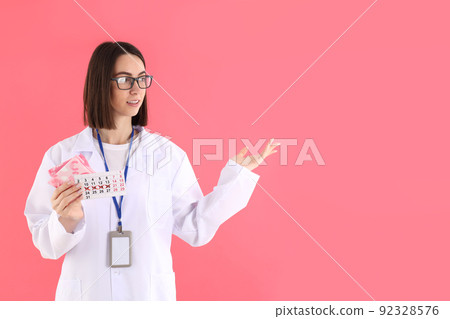 Concept of healthcare worker with young woman, space for text Concept of healthcare worker with young woman, space for text 92328576