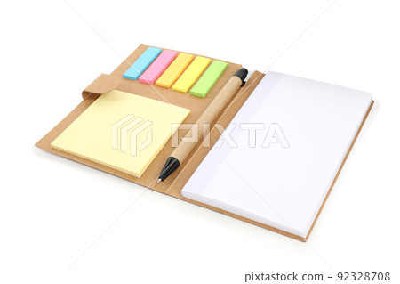 Notebook with office accessories isolated on white background Notebook with office accessories isolated on white background 92328708