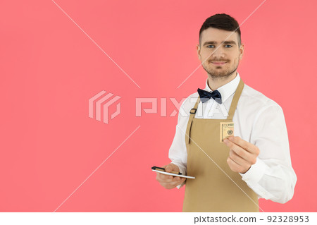Concept of profession with young man waiter Concept of profession with young man waiter 92328953