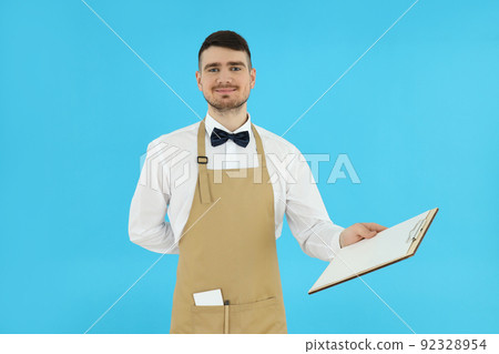 Concept of profession with young man waiter Concept of profession with young man waiter 92328954