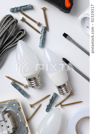 Concept of electrician or electrical tools on white background Concept of electrician or electrical tools on white background 92329317
