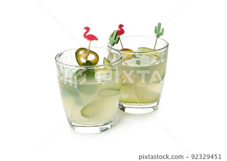Concept of drink with Jalapeno cocktail isolated on white background Concept of drink with Jalapeno cocktail isolated on white background 92329451