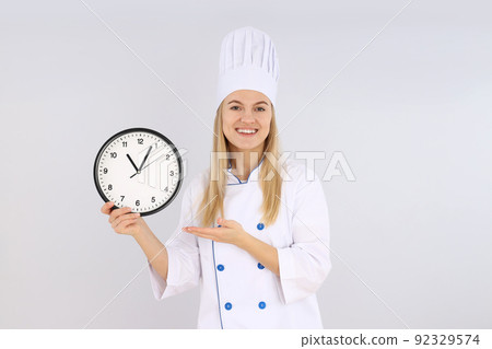 Concept of cooking with young chef woman 92329574