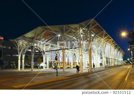 Tram depot illuminated in the evening in the city of Lodz Tram depot illuminated in the evening in the city of Lodz 92331512