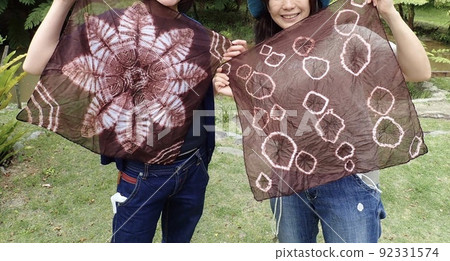 Amami Oshima Mud dyeing experience Two women dyed handkerchiefs 92331574