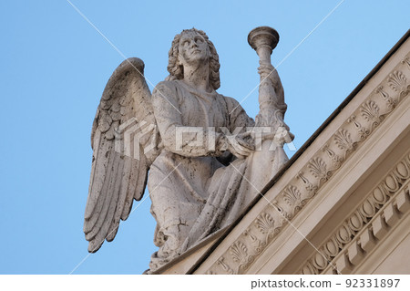 Angel, San Rocco church dedicated to Saint Roch. Founded in 1499 by Pope Alexander VI as the chapel of an adjacent hospital in Rome, Italy. Angel, San Rocco church dedicated to Saint Roch. Founded in 1499 by Pope Alexander VI as the chapel of an adjacent hospital in Rome, Italy. 92331897