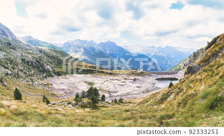 Dam with reservoir drained by drought Dam with reservoir drained by drought 92333251