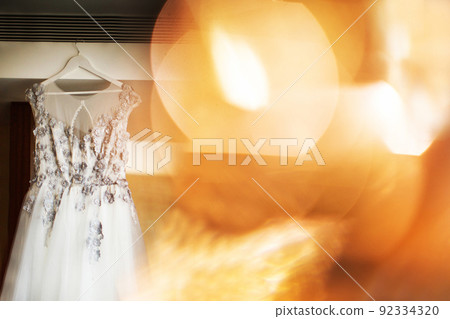 Wedding dress on the wall with highlights 92334320