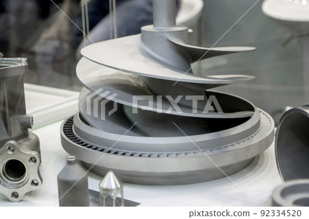 Model object of a large industrial part printed on a 3D printer from metal close-up. New modern progressive additive 3D printing technology. Industry factory plant manufacturing metalwork industrial 92334520