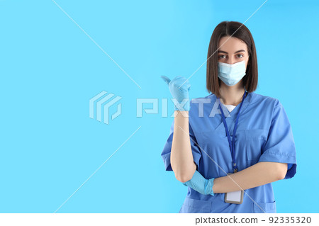 Concept of healthcare worker with young woman, space for text Concept of healthcare worker with young woman, space for text 92335320
