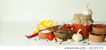 Concept of tasty food with adjika, space for text Concept of tasty food with adjika, space for text 92335572