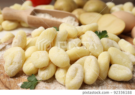 Concept of cooking with raw potato gnocchi, close up Concept of cooking with raw potato gnocchi, close up 92336188