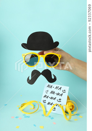 Concept of April Fool's Day on blue background Concept of April Fool's Day on blue background 92337069