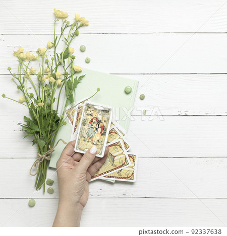 Concept of psychic advisor or ways of divination with cards. 92337638