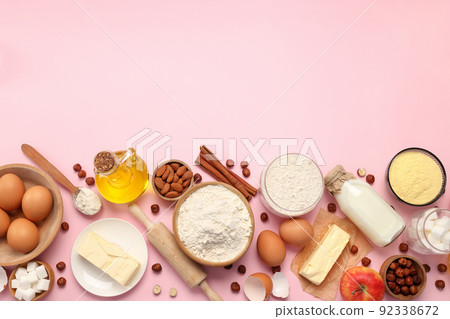 Ingredients for pie or cake cooking on pink background 92338672