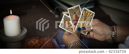 Concept of psychic advisor or ways of divination with cards. 92338739