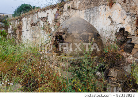 Old dilapidated abandoned house with traditional oven on the island of Sardinia 92338928