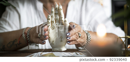 Concept of psychic advisor or ways of divination with cards. Concept of psychic advisor or ways of divination with cards. 92339040