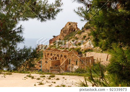 Old mine ruins in the area between Masua and Nebida on Sardinia island Old mine ruins in the area between Masua and Nebida on Sardinia island 92339973