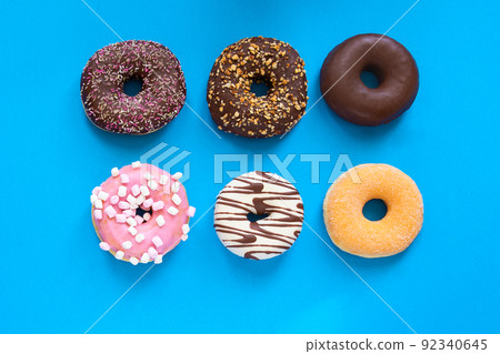 donuts on blue background donuts on blue background 92340645