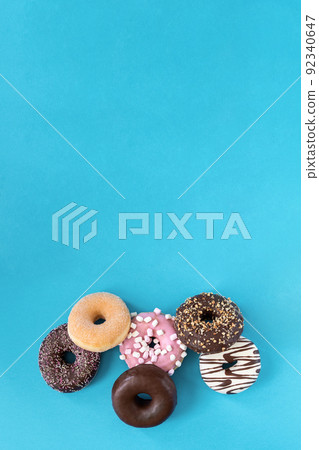 donuts on blue background donuts on blue background 92340647