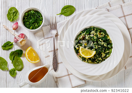 Spanakorizo, Greek spinach and rice pilaf in bowl 92341022