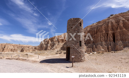 Civilian Conservation Corps Water Tower and Rock Formation in the desert Civilian Conservation Corps Water Tower and Rock Formation in the desert 92343119