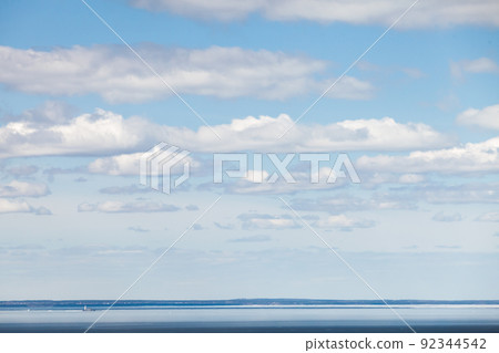 Landscape with sea water under cloudy sky 92344542
