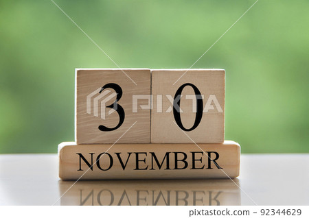 November 30 calendar date text on wooden blocks with copy space for ideas or text. Copy space 92344629