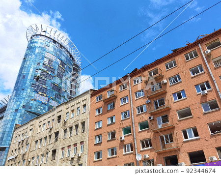 Kyiv, Ukraine - July 10, 2022: The building renovation after Russian rocket attack on Kyiv Kyiv, Ukraine - July 10, 2022: The building renovation after Russian rocket attack on Kyiv 92344674