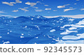 ocean waves with clear sky and sun rays on blue water 92345573